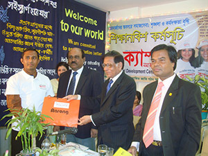 Advisor to the Former Caretaker Government, Mahbub Jamil, is giving Special Gift to the Best Leader of Apprenticeship Program as Chief Guest; Next to him CEO of               Partex Group, K.M Ali and Secretary-General of CSDC, Dr. M Helal. (2009)